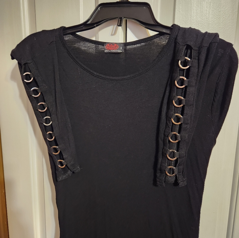 Black stretchy long sleeve top with key ring adornments on lower sleeves.